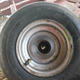Wheel: with fixed tire, but now lacking bearing and seal ...
